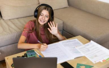 Student wearing a pair of headphones