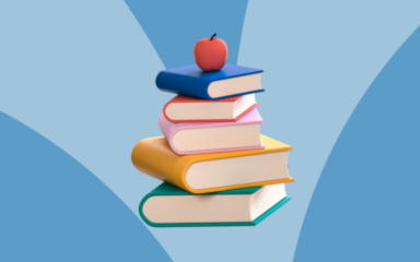 Stack of colorful books topped with a red apple against a blue background representing virtual learning and education.